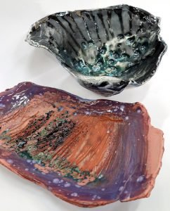 two ceramic dishes by artist Tim McCall